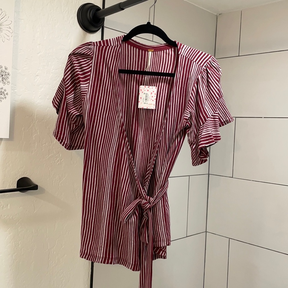 Free people tie wrap shirt. Never worn with tags
